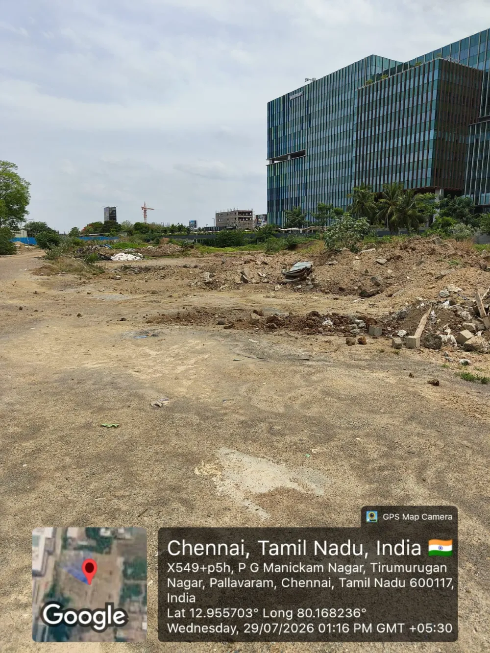 TVS Emerald Avalon site photo, Zamin Pallavaram, Chennai — view along the plot towards the main road, 29 July 2026